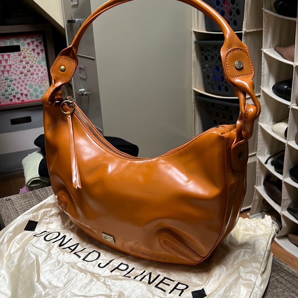 Donald Pliner orange patent leather purse